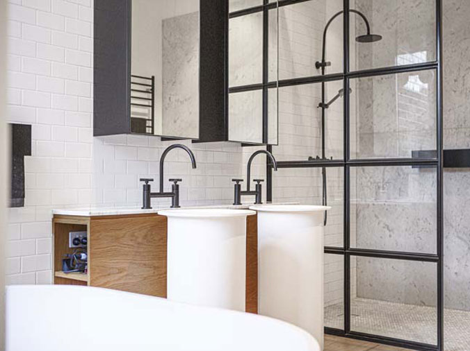 Bathroom with twon sink faucets